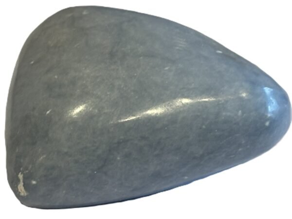 Polished natural angelite carved heart crystal 3 sians emporium Smooth polished blue angelite carved heart crystal showing natural white mineral flecks on a white background